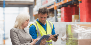 Warehouse Managers and Supervisors reviewing layout of the Warehouse