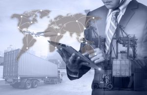 Supply Chain Manager holding tablet, managing Logistics Operations