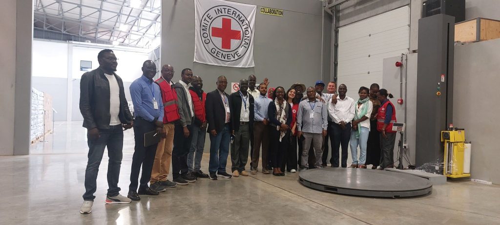 A photograph taken from one of our visits to the ICRC Regional Logistics Center in Nairobi, Kenya, featuring students of our HELM training sessions.